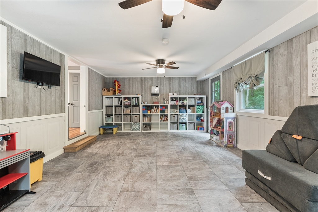 95 Ely Road Monson, MA 01057 - Photo 24 of 42 a view of a livingroom with furniture and a flat screen tv