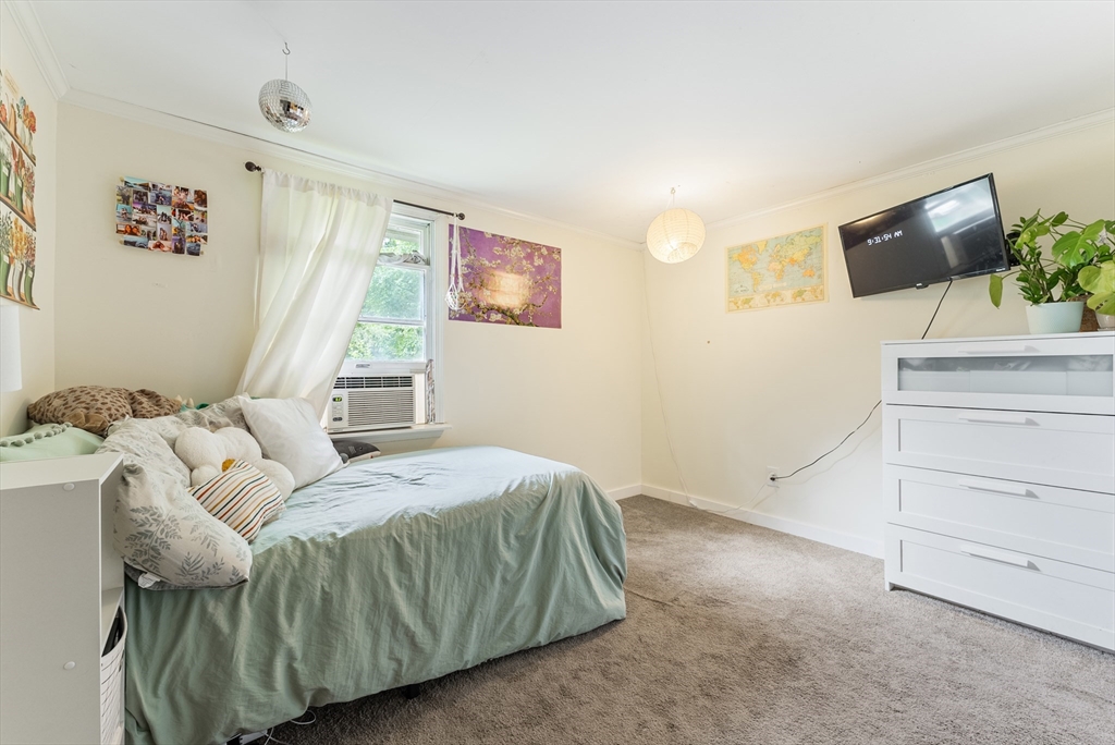 95 Ely Road Monson, MA 01057 - Photo 34 of 42 a living room with furniture and a flat screen tv