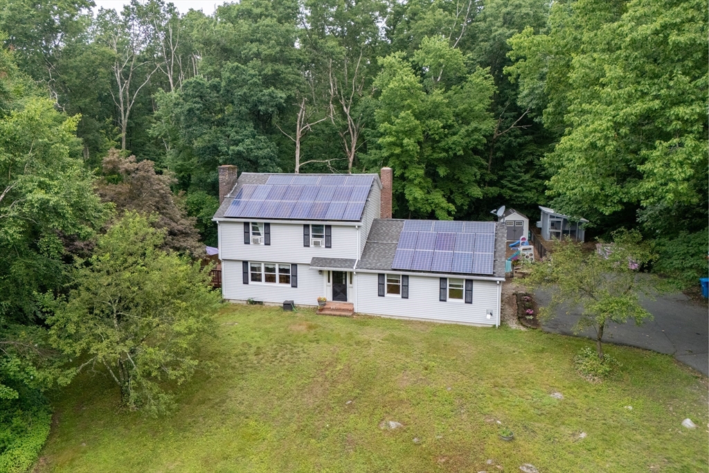 95 Ely Road Monson, MA 01057 - Photo 4 of 42 an aerial view of a house with swimming pool next to a yard