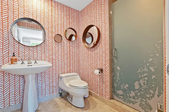 a view of a hallway with washer and dryer