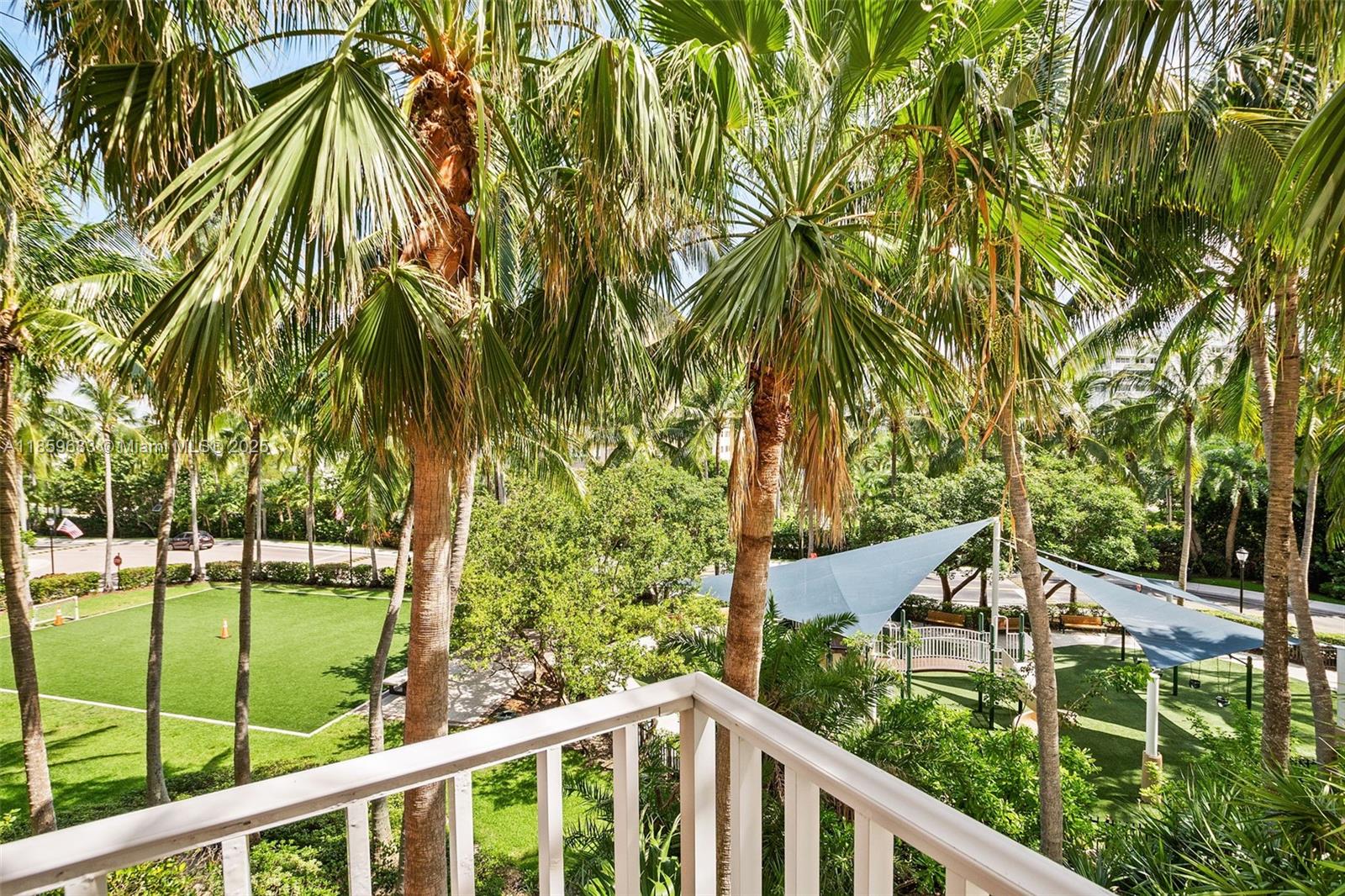 781 Crandon Boulevard, Unit 306 Key Biscayne, FL 33149 - Photo 31 of 32 a view of a garden