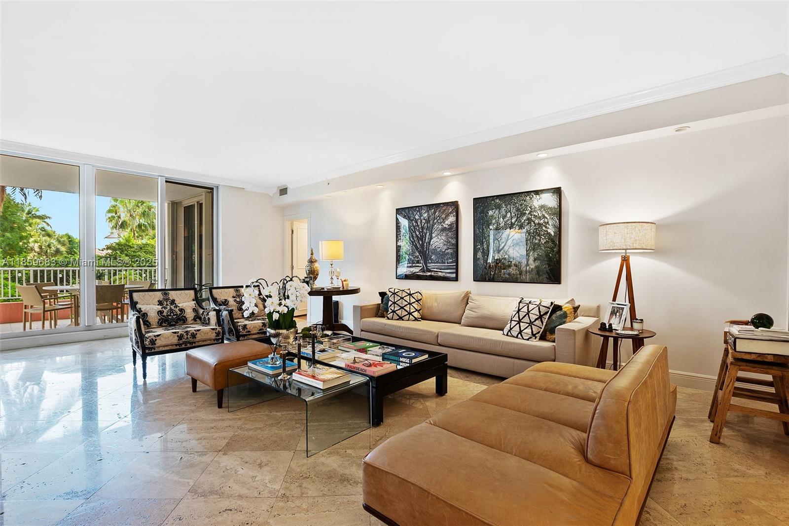 781 Crandon Boulevard, Unit 306 Key Biscayne, FL 33149 - Photo 8 of 32 a living room with furniture and a large window