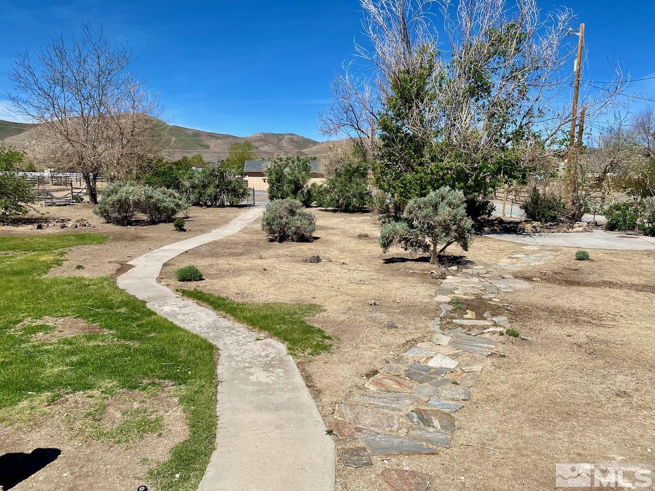 10775 Osage Road Reno, NV 89508 - Photo 18 of 22 a view of a backyard of a house