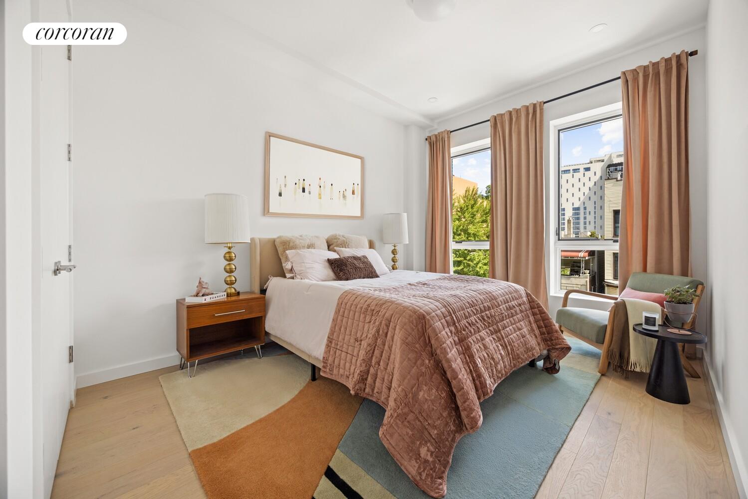 48 Stanhope Street, Unit 3R Brooklyn, NY 11221 - Photo 5 of 9 a bedroom with a bed and a window