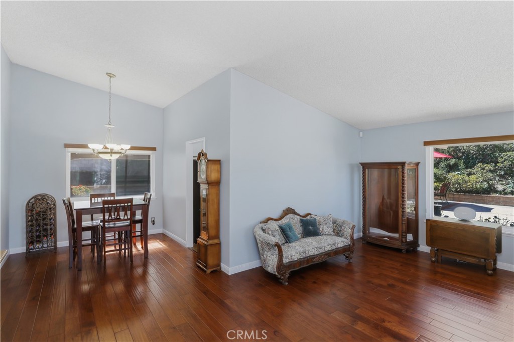 1340 Cadwell Court Riverside, CA 92506 - Photo 13 of 63 a living room with furniture and a wooden floor