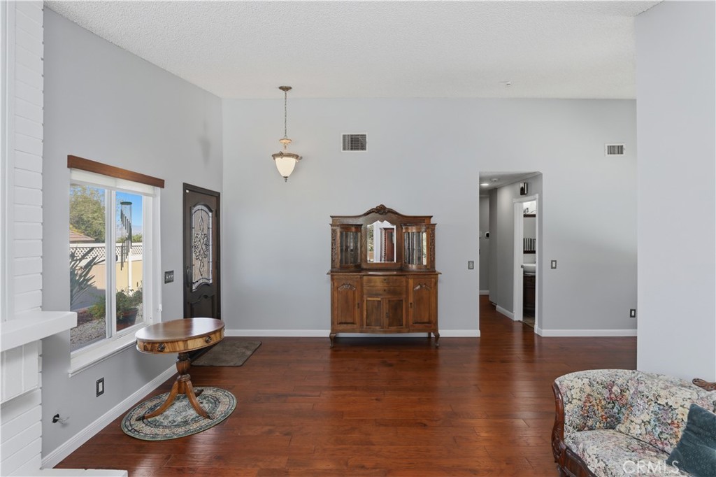 1340 Cadwell Court Riverside, CA 92506 - Photo 16 of 63 a living room with furniture and a window