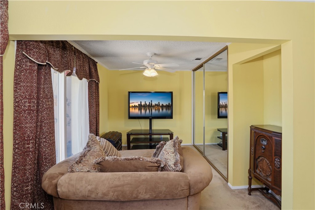 1340 Cadwell Court Riverside, CA 92506 - Photo 29 of 63 a living room with furniture and a large window