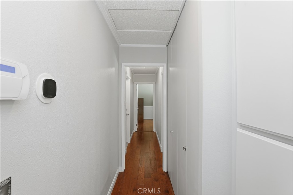 1340 Cadwell Court Riverside, CA 92506 - Photo 33 of 63 a view of a hallway with wooden floor