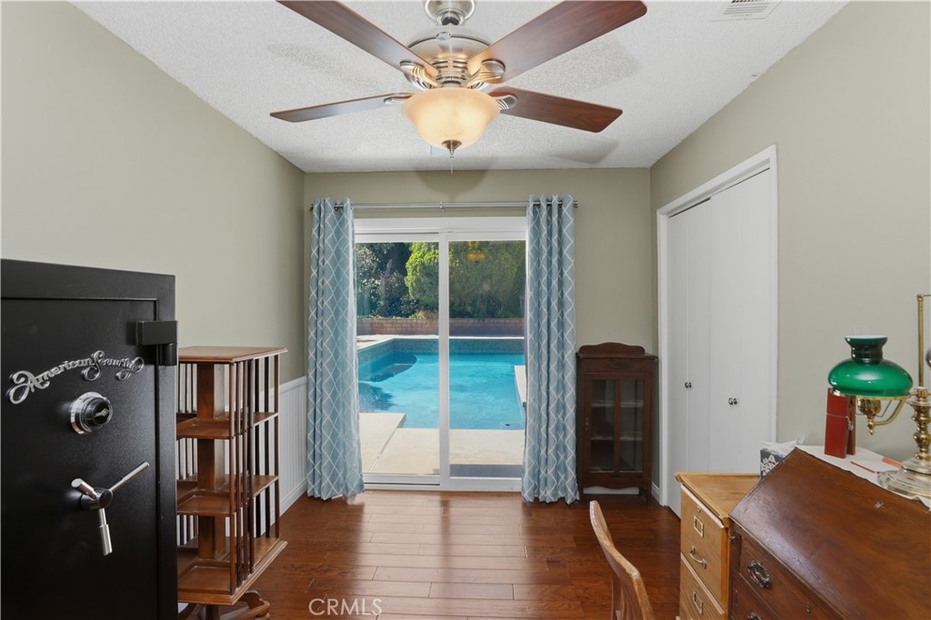 1340 Cadwell Court Riverside, CA 92506 - Photo 34 of 63 a view of a workspace with furniture and a window