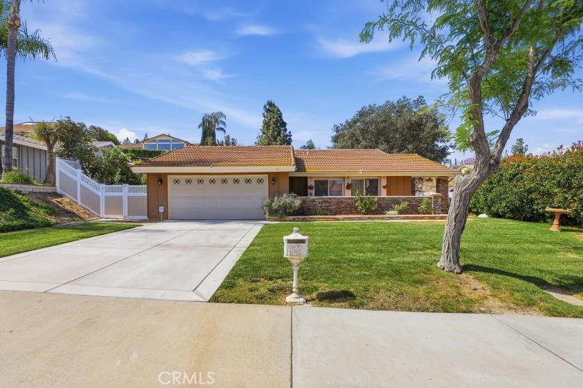 1340 Cadwell Court Riverside, CA 92506 - Photo 4 of 63 front view of house with a yard