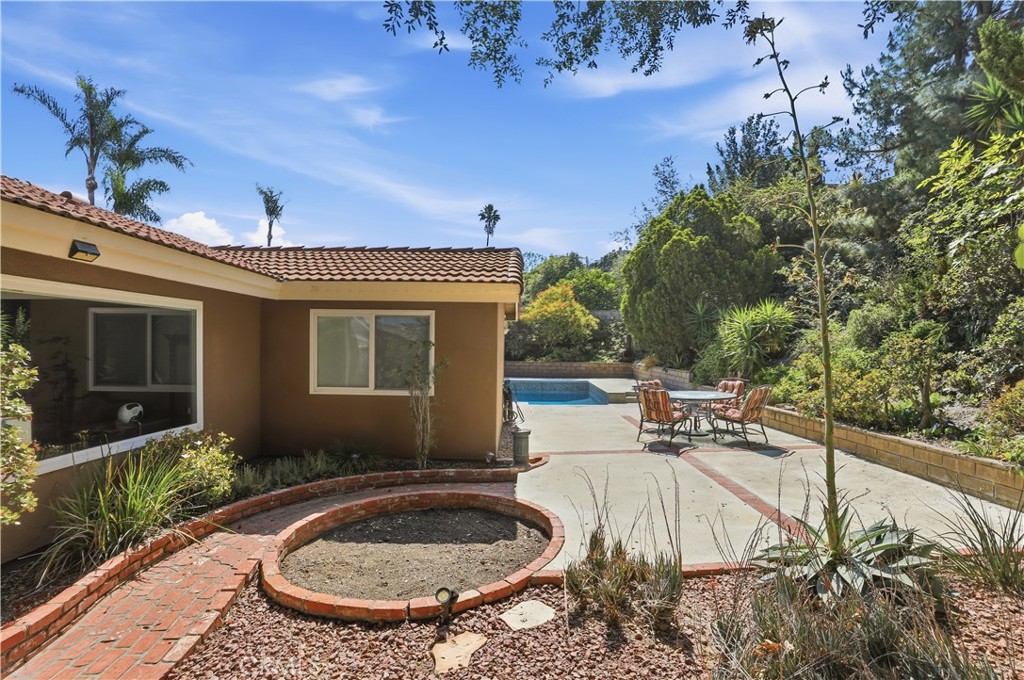 1340 Cadwell Court Riverside, CA 92506 - Photo 48 of 63 a view of a house with backyard and sitting area