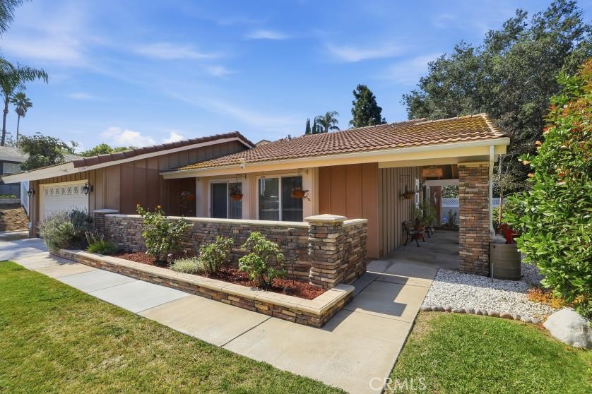 1340 Cadwell Court Riverside, CA 92506 - Photo 5 of 63 front view of house with a yard