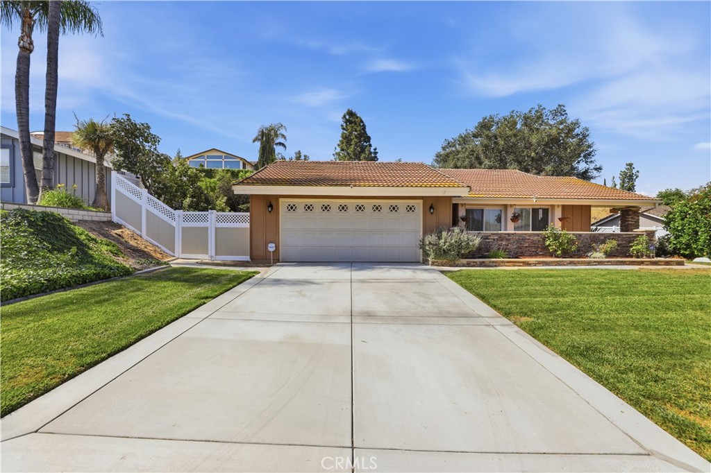 1340 Cadwell Court Riverside, CA 92506 - Photo 58 of 63 a front view of a house with a yard
