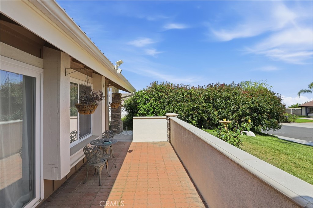 1340 Cadwell Court Riverside, CA 92506 - Photo 6 of 63 a view of a balcony with wooden floor and fence