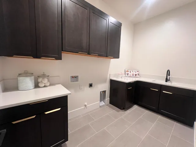 a bedroom with a large bed and a large window