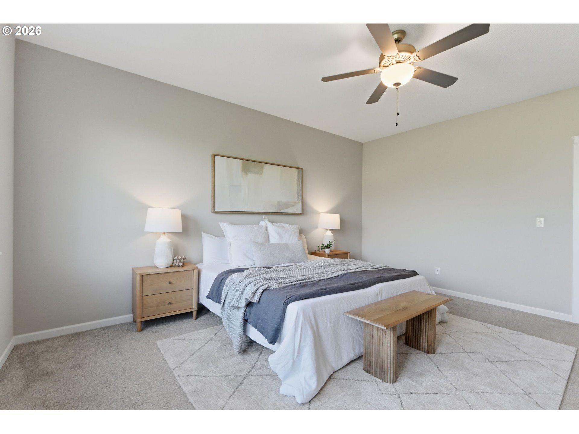 33068 Northwest Ej Smith Road Scappoose, OR 97056 - Photo 23 of 43 a bedroom with a bed and a chandelier