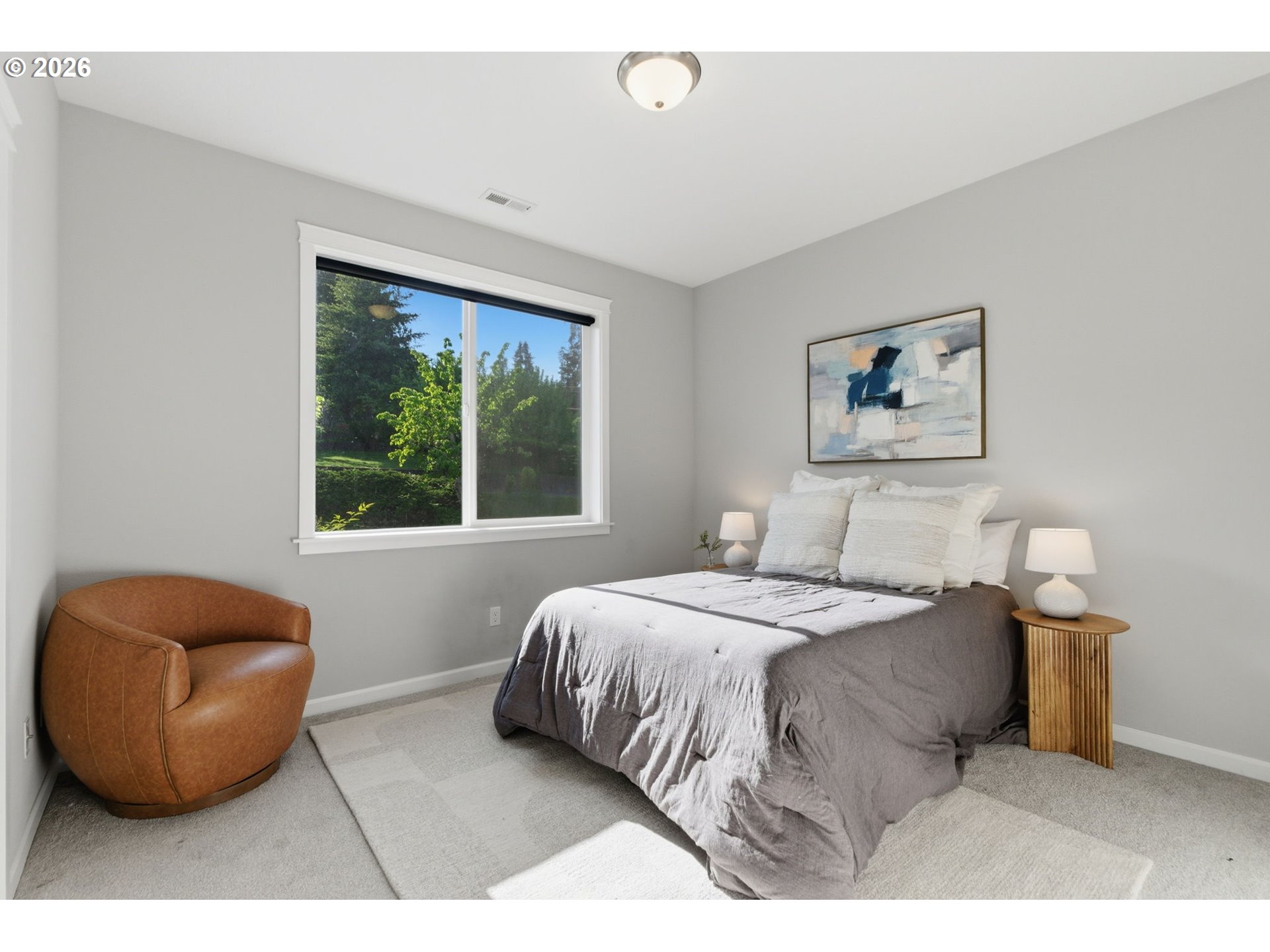 33068 Northwest Ej Smith Road Scappoose, OR 97056 - Photo 28 of 43 a bedroom with a bed and window