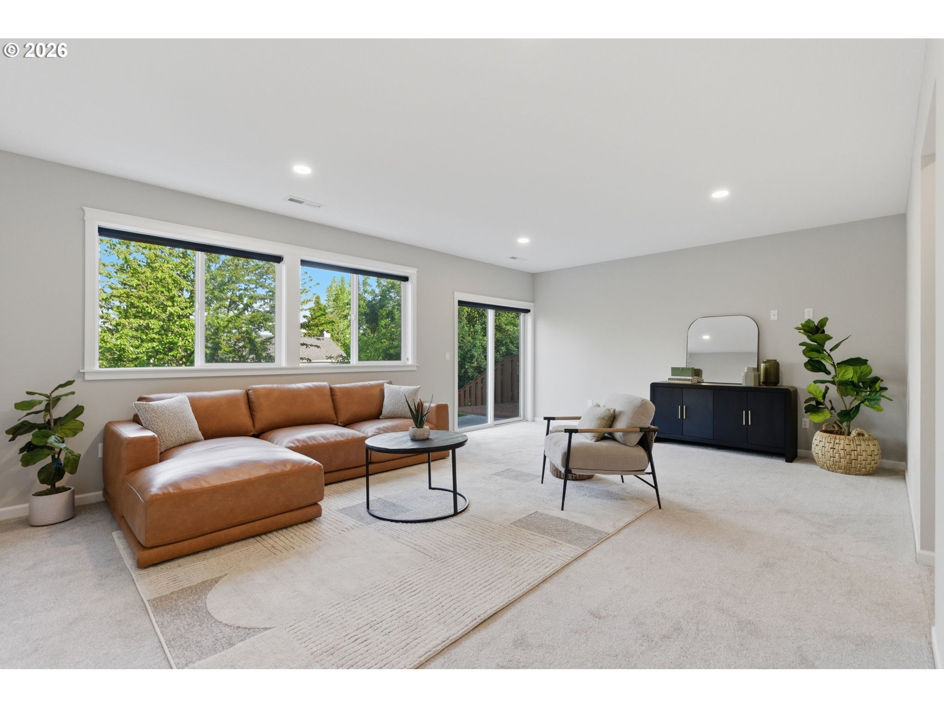 33068 Northwest Ej Smith Road Scappoose, OR 97056 - Photo 33 of 43 a living room with furniture and a large window