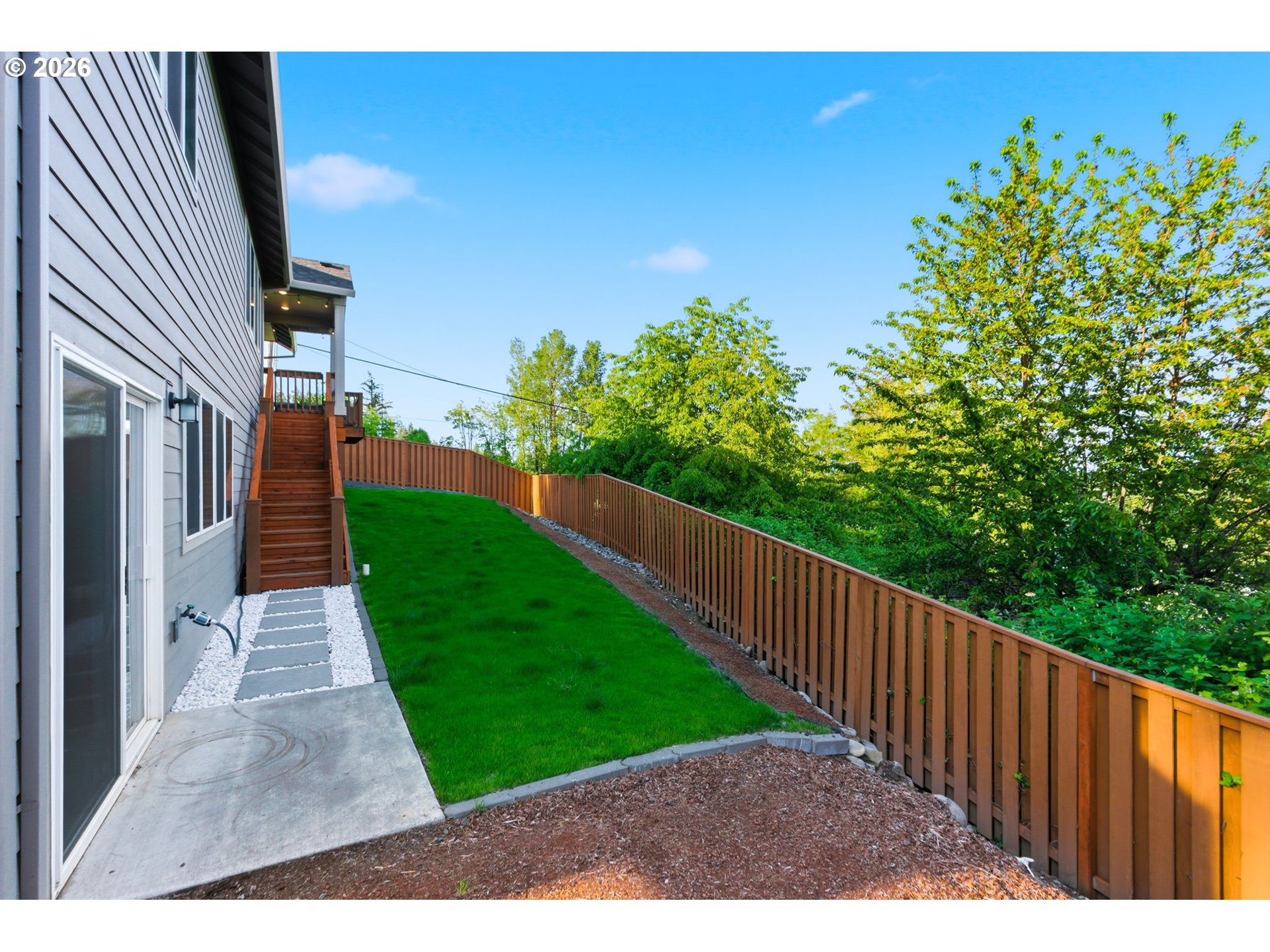 33068 Northwest Ej Smith Road Scappoose, OR 97056 - Photo 40 of 43 a view of a backyard with pathway