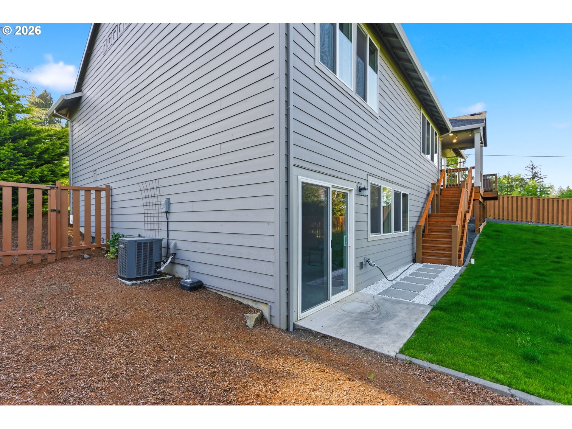 33068 Northwest Ej Smith Road Scappoose, OR 97056 - Photo 41 of 43 a view of a house with a yard and deck