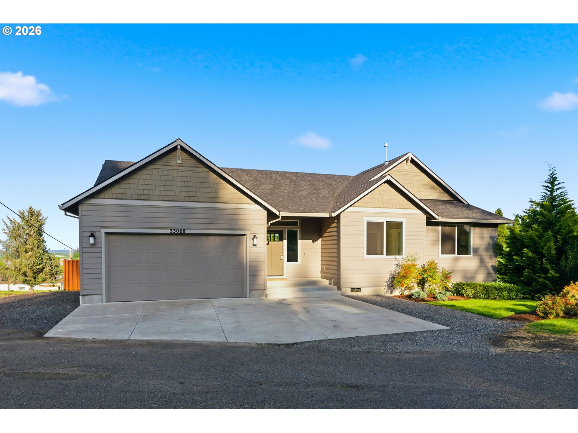 33068 Northwest Ej Smith Road Scappoose, OR 97056 - Photo 5 of 43 a view of front of house with a yard