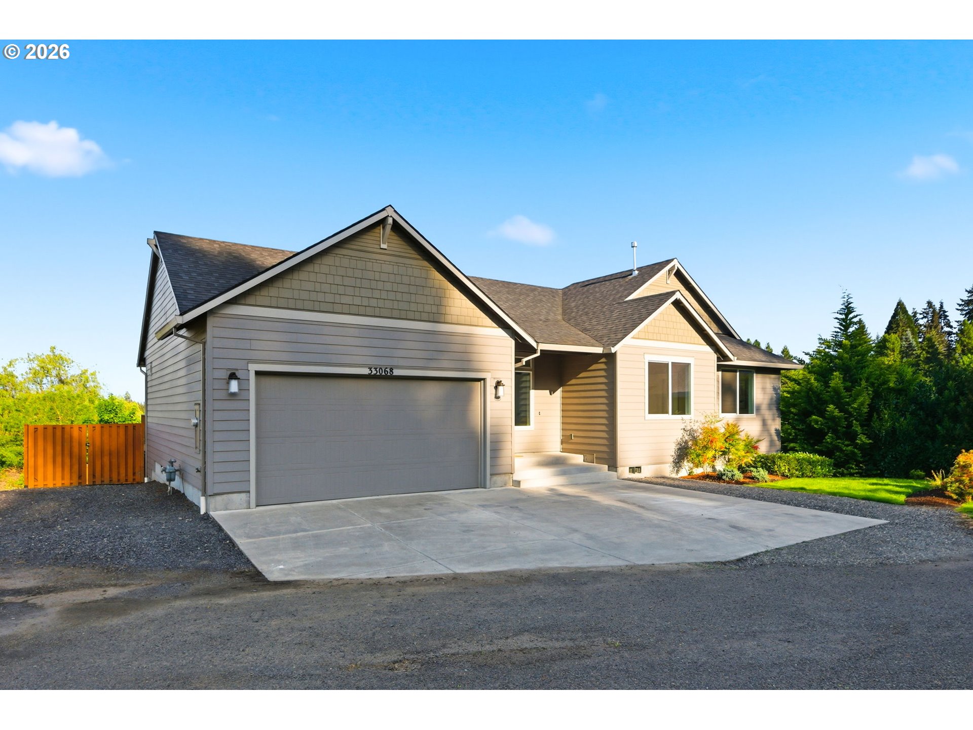 33068 Northwest Ej Smith Road Scappoose, OR 97056 - Photo 6 of 43 a front view of a house with a yard