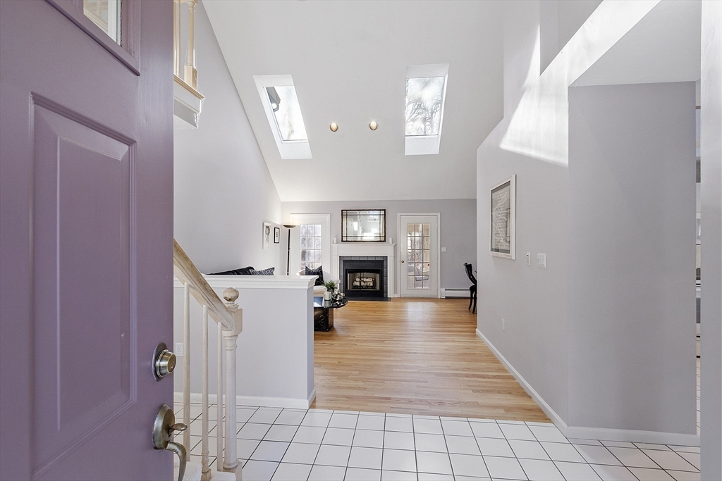 34 Pickman Drive Bedford, MA 01730 - Photo 3 of 38 a view of a livingroom with a fireplace