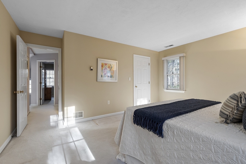 34 Pickman Drive Bedford, MA 01730 - Photo 31 of 38 a bedroom with a bed and a window