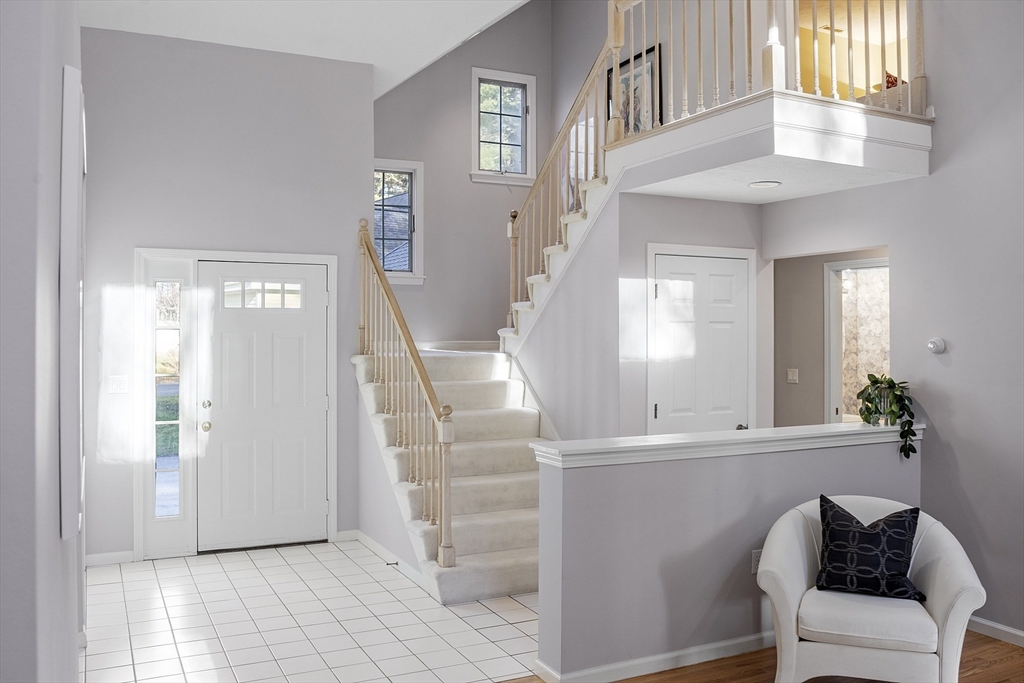 34 Pickman Drive Bedford, MA 01730 - Photo 5 of 38 a view of entryway and hall with a window