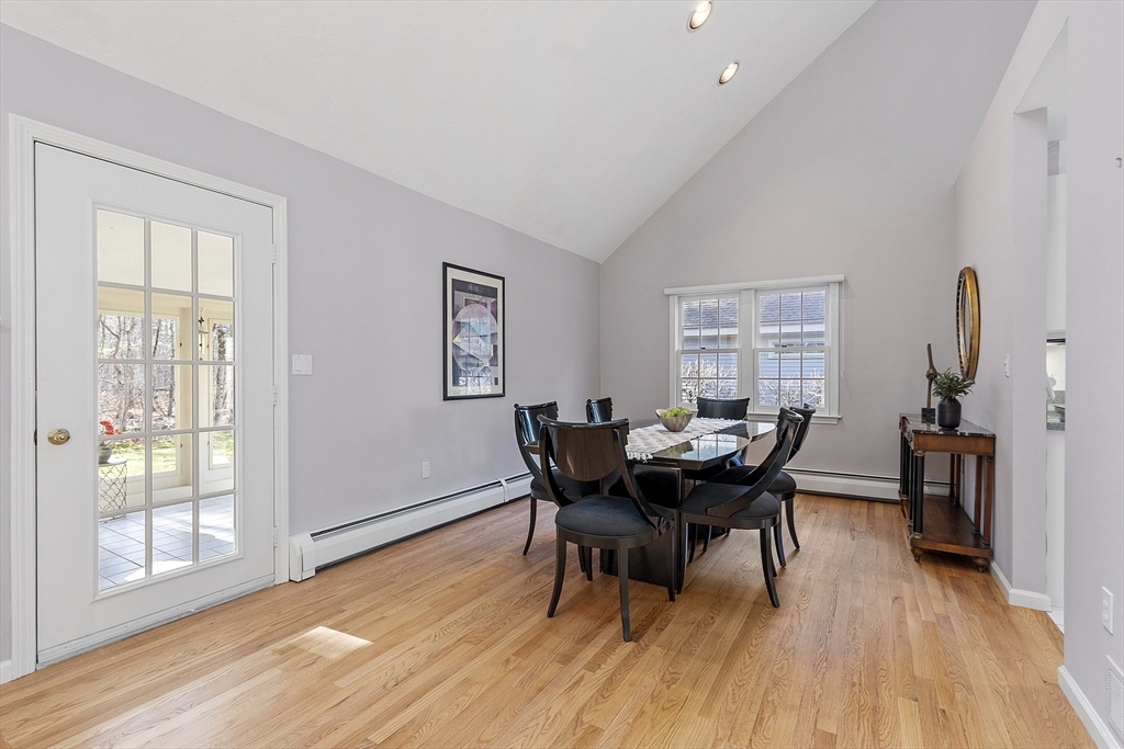 34 Pickman Drive Bedford, MA 01730 - Photo 9 of 38 a view of a dining room with furniture and wooden floor