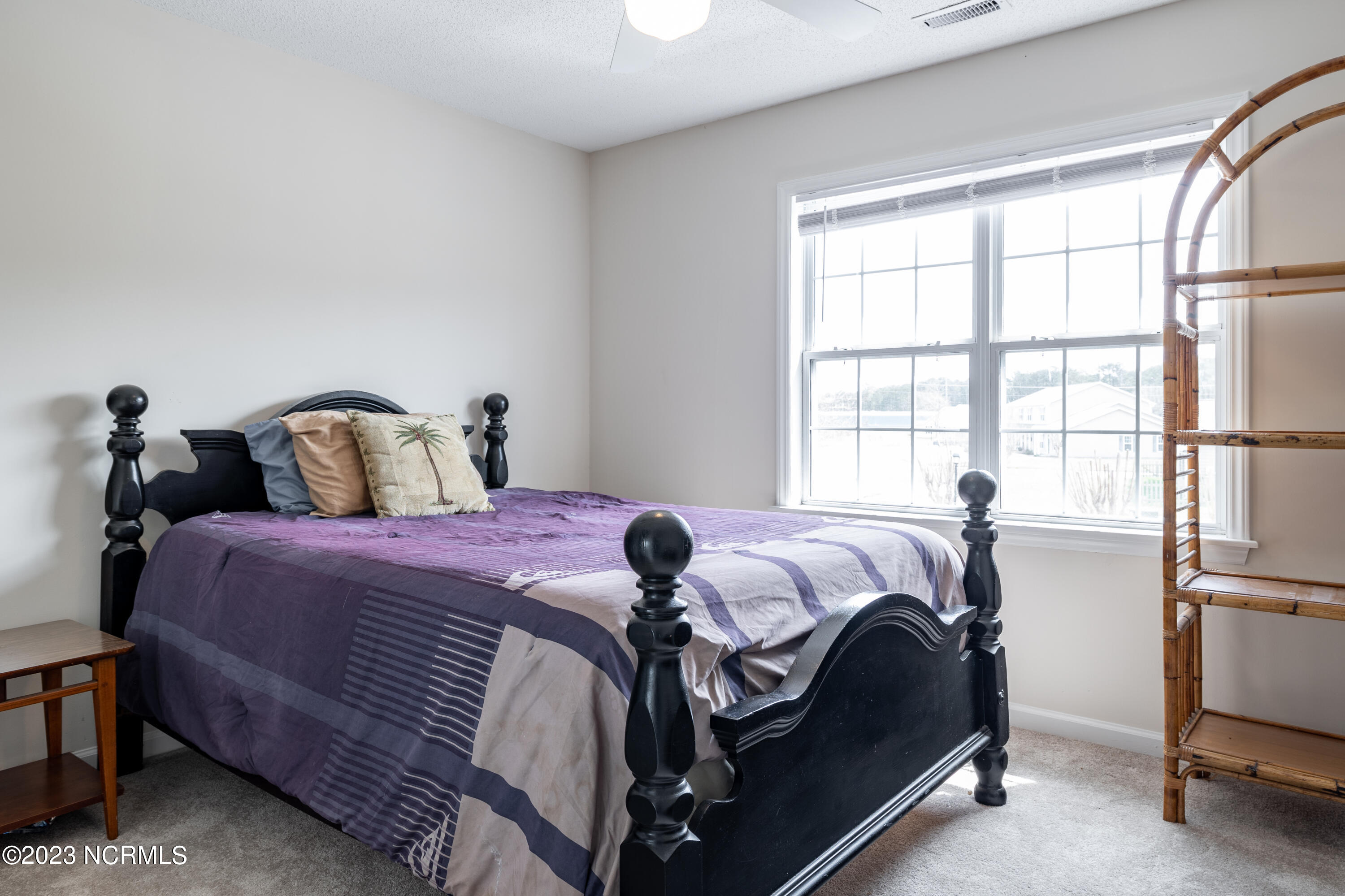 601 Peletier Loop Road, Unit E27 Swansboro, NC 28584 - Photo 13 of 17 Bedroom 1 - En suite