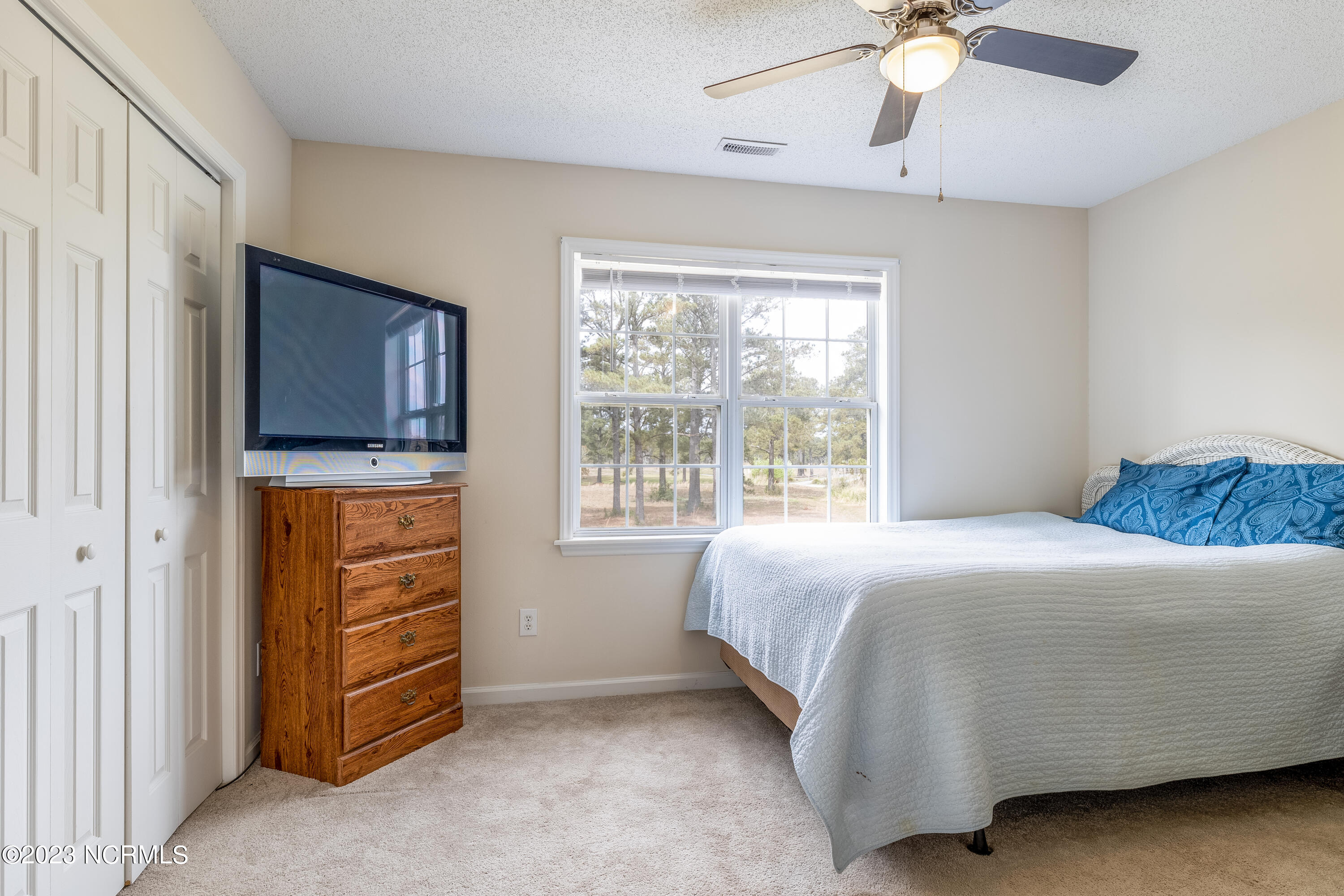 601 Peletier Loop Road, Unit E27 Swansboro, NC 28584 - Photo 15 of 17 Bedroom 2 - En suite