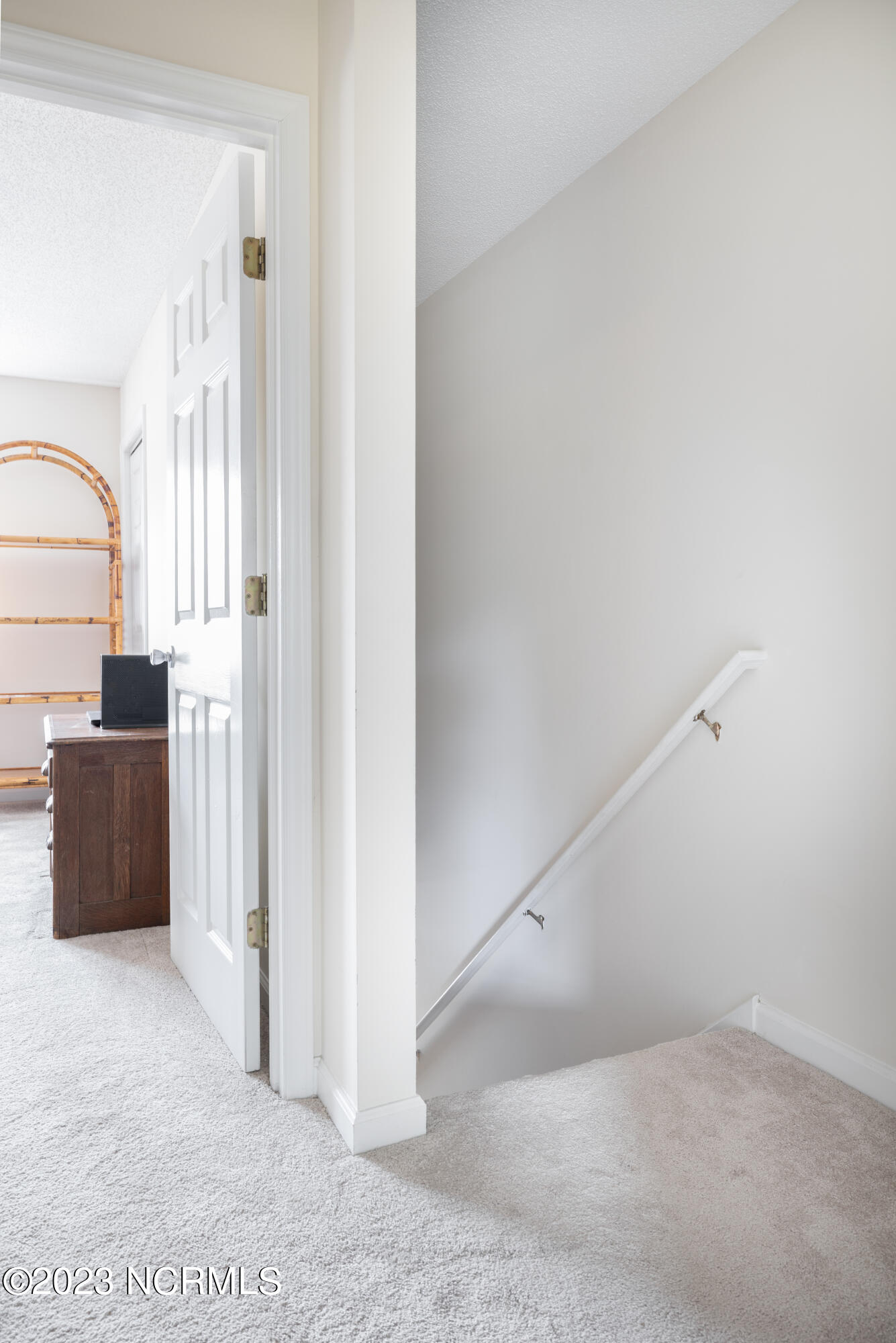 601 Peletier Loop Road, Unit E27 Swansboro, NC 28584 - Photo 17 of 17 Upstairs Hall - Linen Closet conveniently located between bedrooms