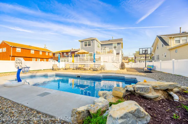 an aerial view of residential building and parking space