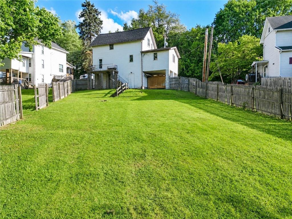 741 Center Avenue Butler, PA 16001 - Photo 26 of 27 a view of a house with backyard and a tree