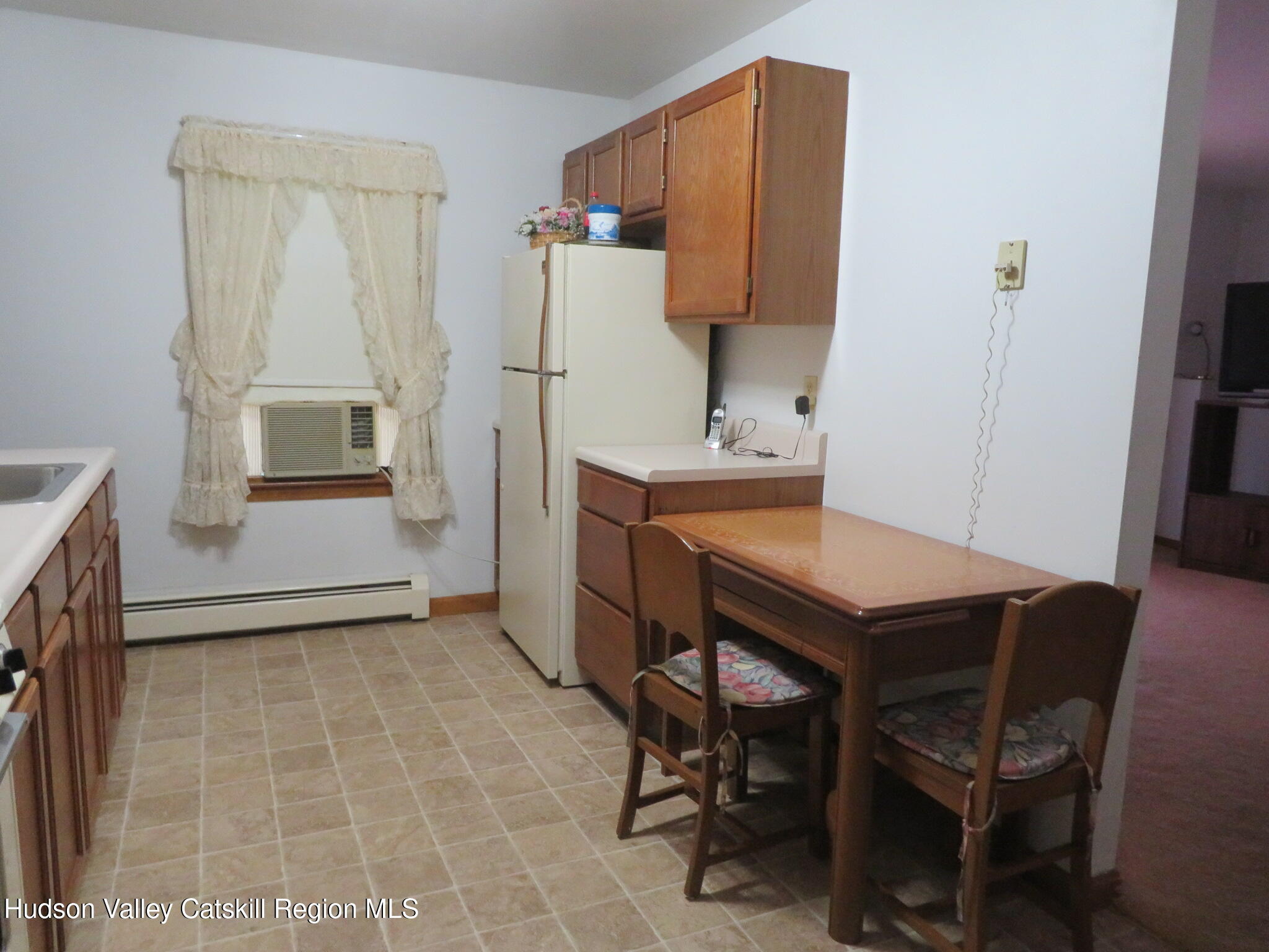 89 Vincent Lane Stone Ridge, NY 12484 - Photo 33 of 45 a workspace room with furniture and wooden floor