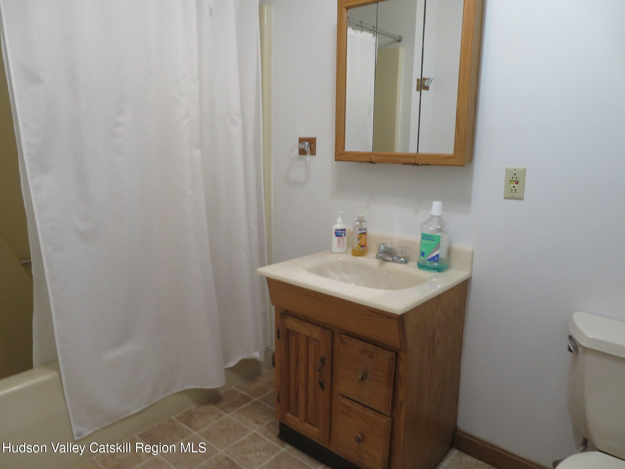 89 Vincent Lane Stone Ridge, NY 12484 - Photo 34 of 45 a utility room with sink dryer and washer