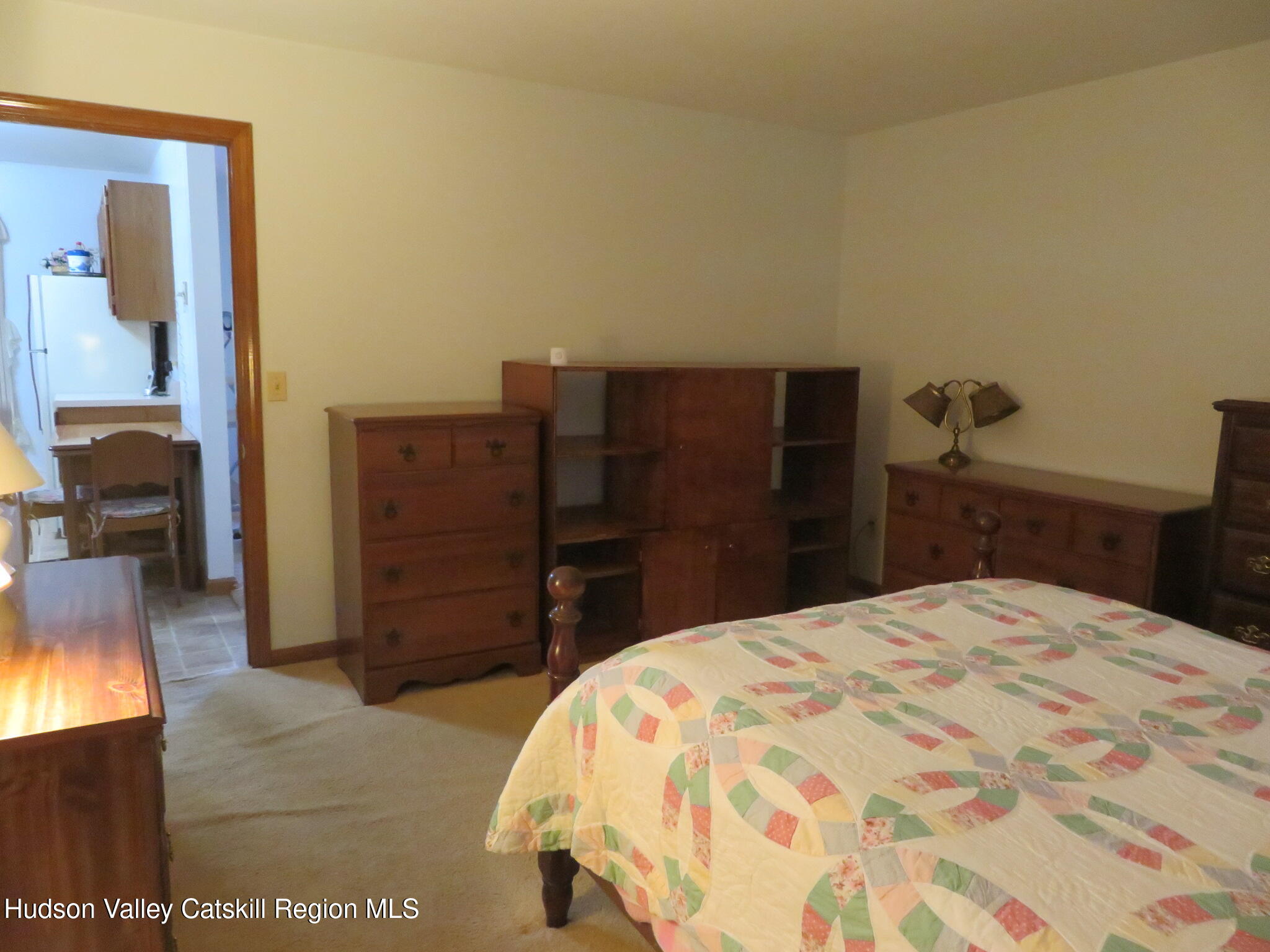 89 Vincent Lane Stone Ridge, NY 12484 - Photo 38 of 45 a bedroom with a bed and furniture