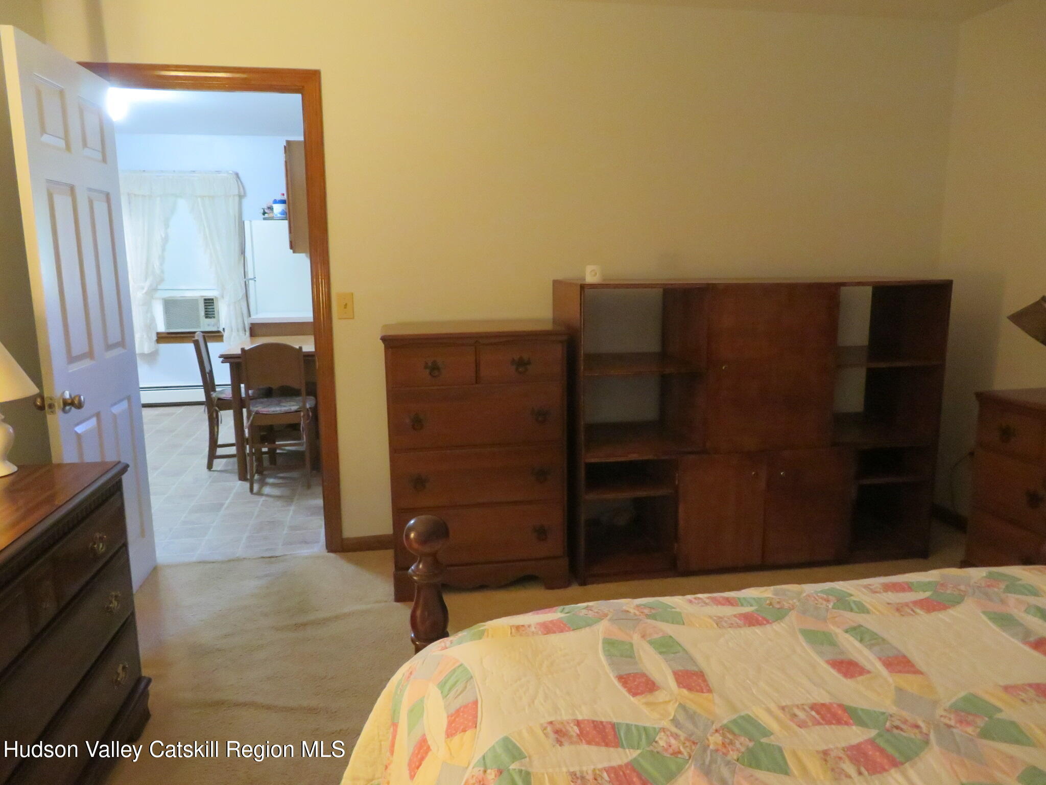 89 Vincent Lane Stone Ridge, NY 12484 - Photo 39 of 45 a bedroom with a bed and furniture