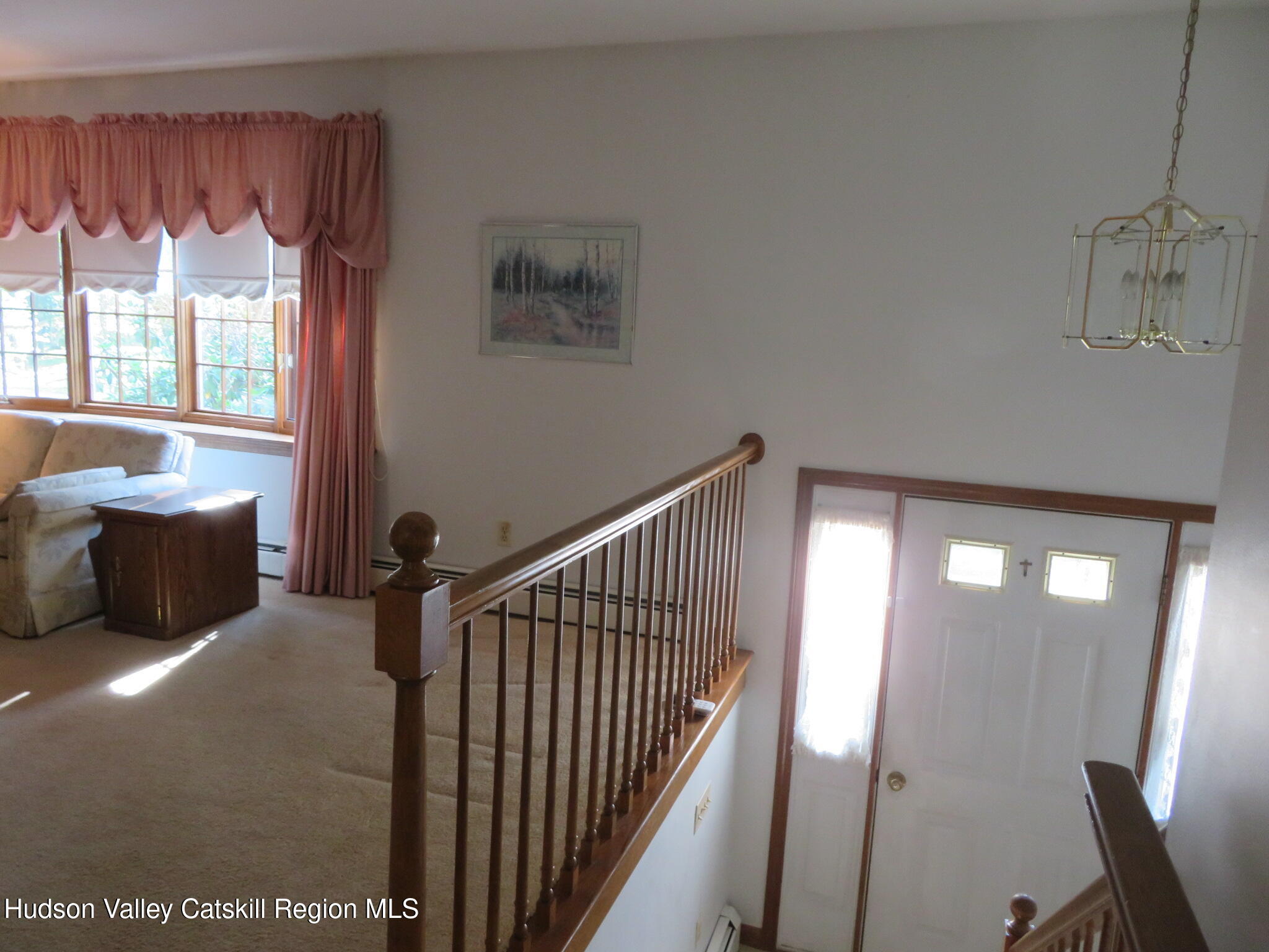 89 Vincent Lane Stone Ridge, NY 12484 - Photo 9 of 45 a view of a livingroom with furniture and windows