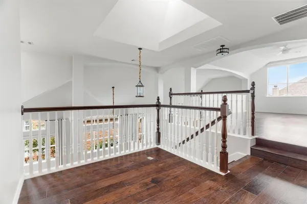 a view of entryway with wooden floor