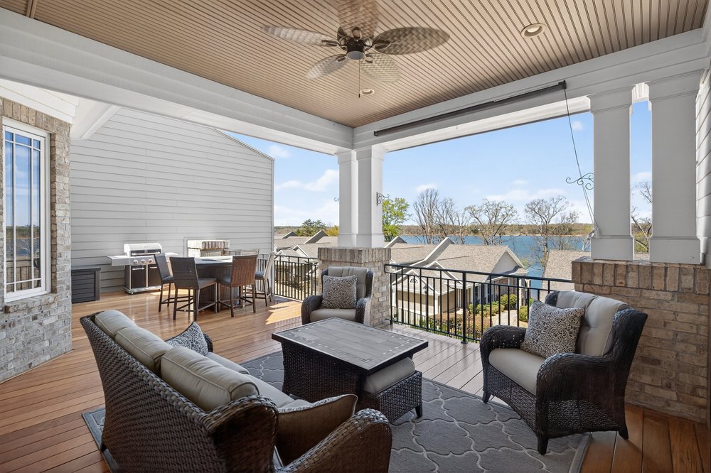 132 Regatta Drive Anderson, SC 29625 - Photo 11 of 50 Enjoy tranquil water views from this expansive outdoor living area.