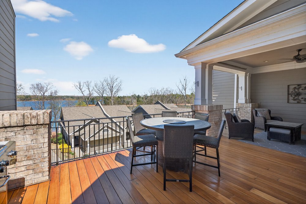 132 Regatta Drive Anderson, SC 29625 - Photo 12 of 50 This expansive deck offers tranquil water views, perfect for gatherings and enjoying the natural surroundings.