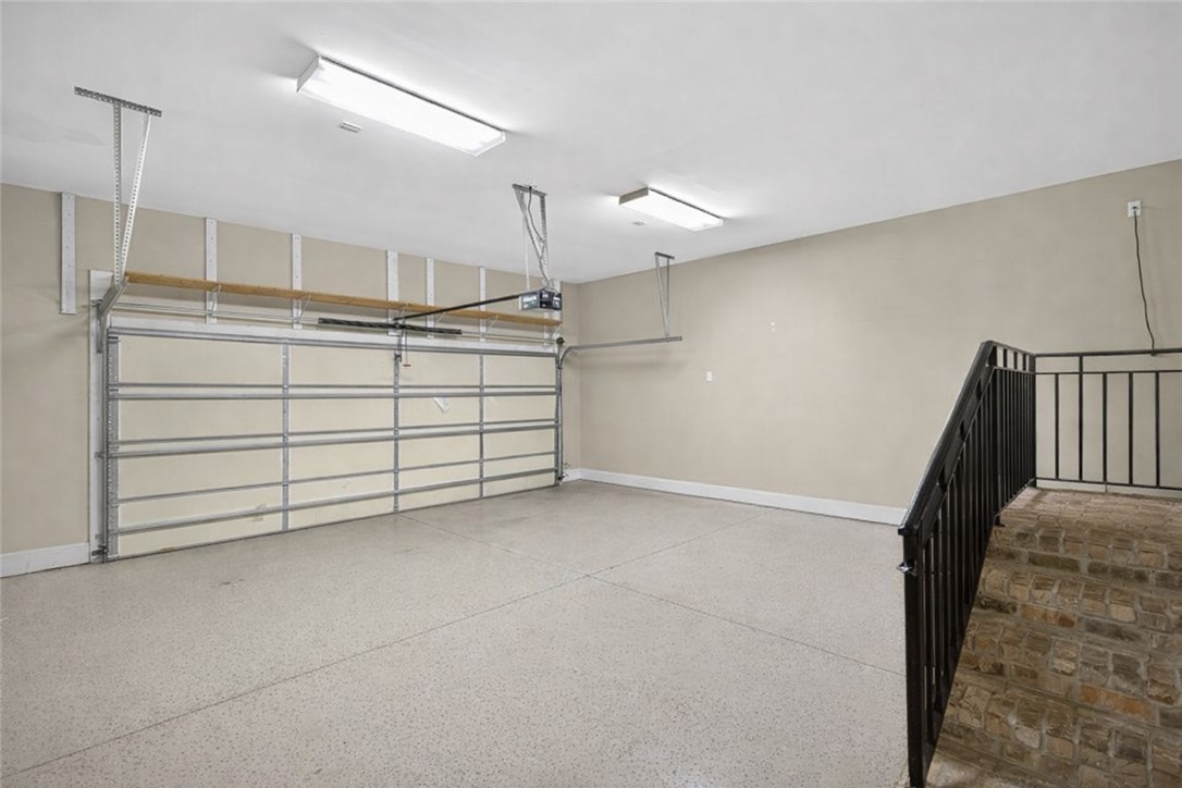 132 Regatta Drive Anderson, SC 29625 - Photo 23 of 50 This spacious garage offers ample parking and additional storage solutions for your needs.