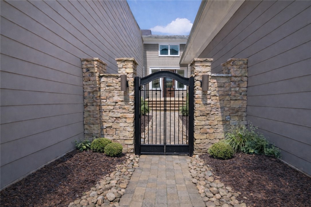 132 Regatta Drive Anderson, SC 29625 - Photo 3 of 50 This charming entryway features a decorative gate and beautiful private court yard.