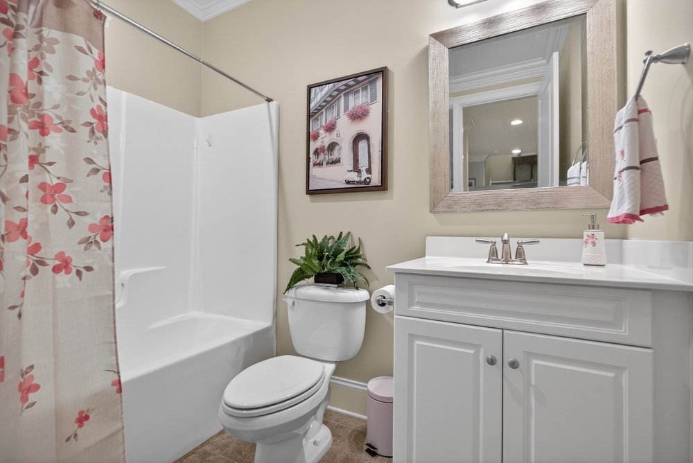 132 Regatta Drive Anderson, SC 29625 - Photo 34 of 50 This clean and inviting bathroom features a convenient shower-tub combination and ample vanity space.