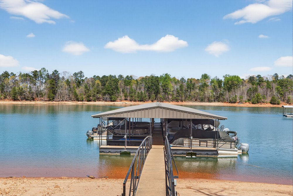 132 Regatta Drive Anderson, SC 29625 - Photo 43 of 50 This tranquil waterfront retreat features a private dock for all your aquatic adventures.