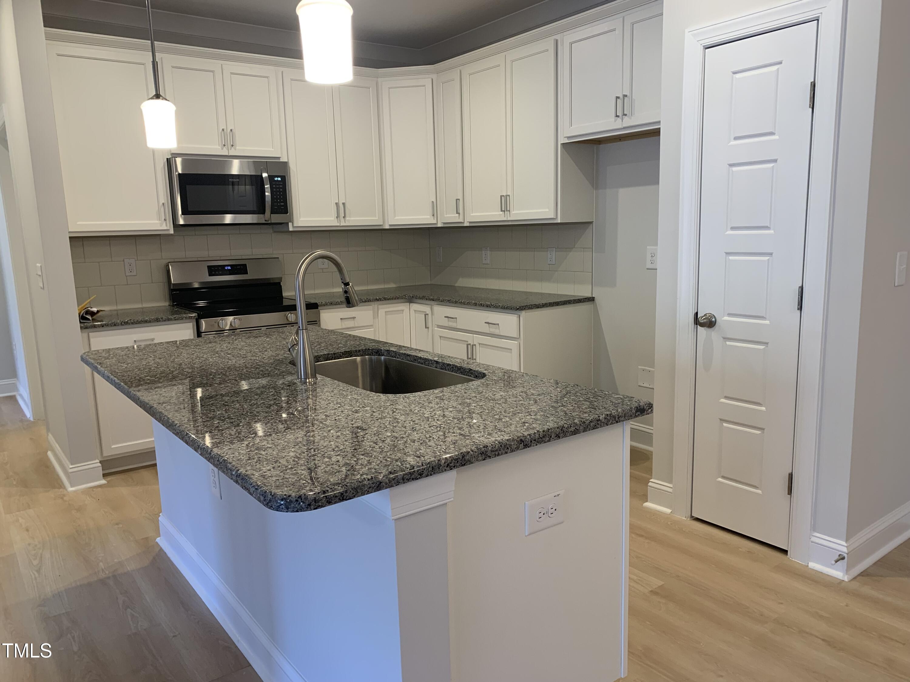 415 Weather Ridge Lane Cary, NC 27513 - Photo 6 of 15 {WCC 415 Kitchen2