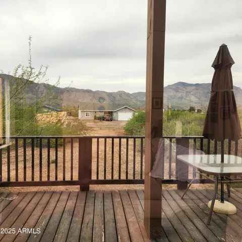 a view of a house with mountain view