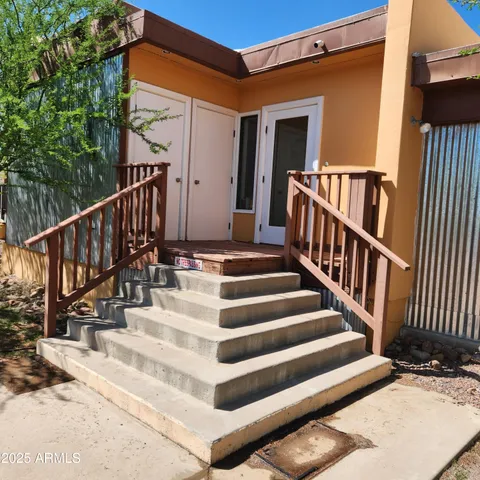 a view of entryway with a front door